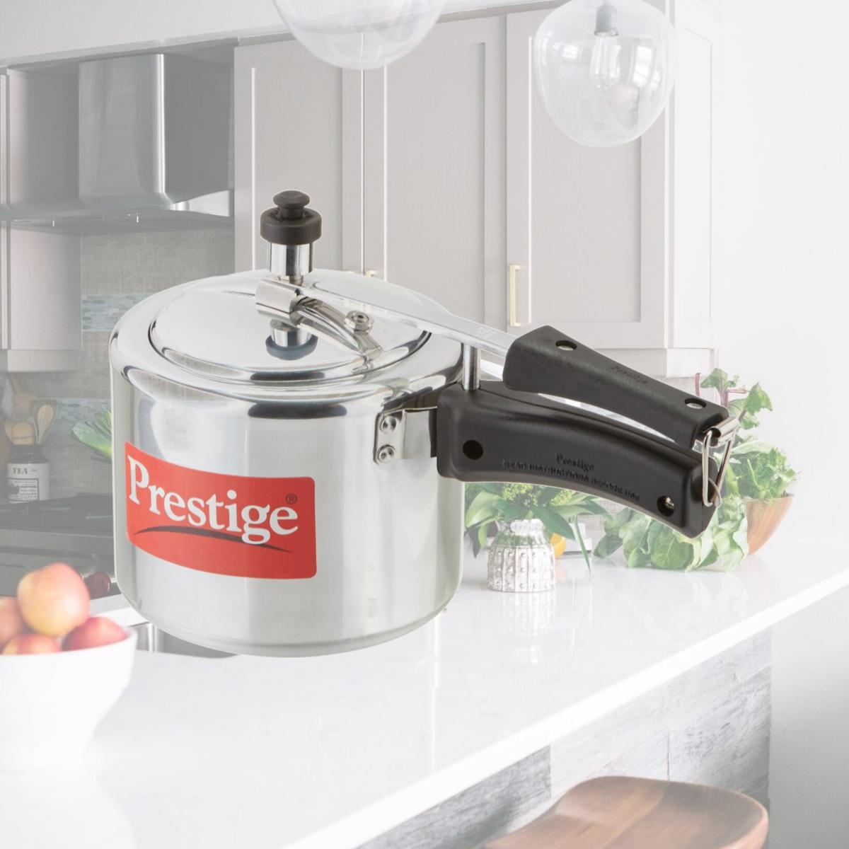 Picture of Prestige PRNPC3 Small Nakshatra Plus Flat Base Aluminum Pressure Cooker for Gas and Induction Stove Silver - 3 Litres