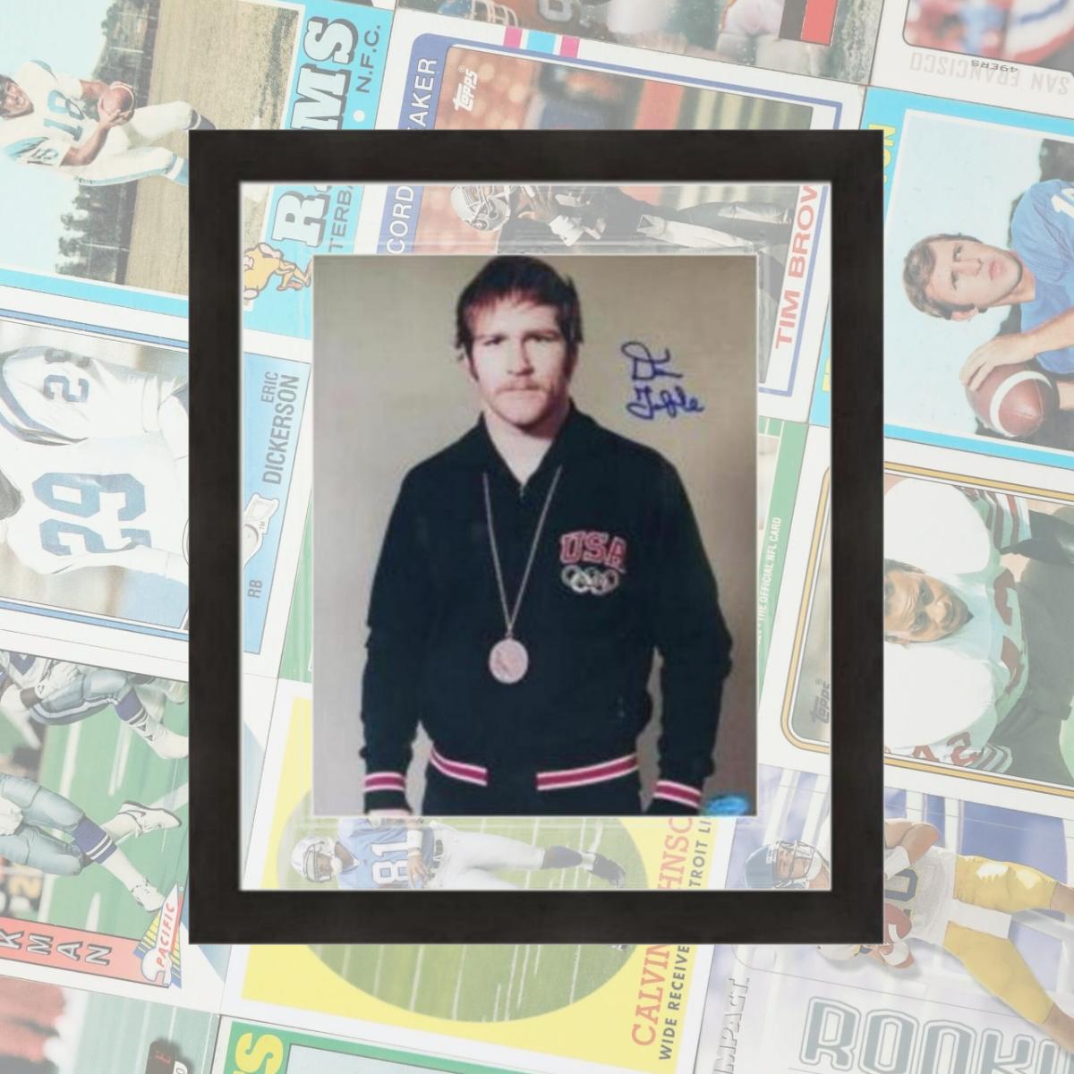 Picture of Autograph Warehouse 408956 8 x 10 in. Dan Gable Autographed Photo No. 22 Matted & Framed