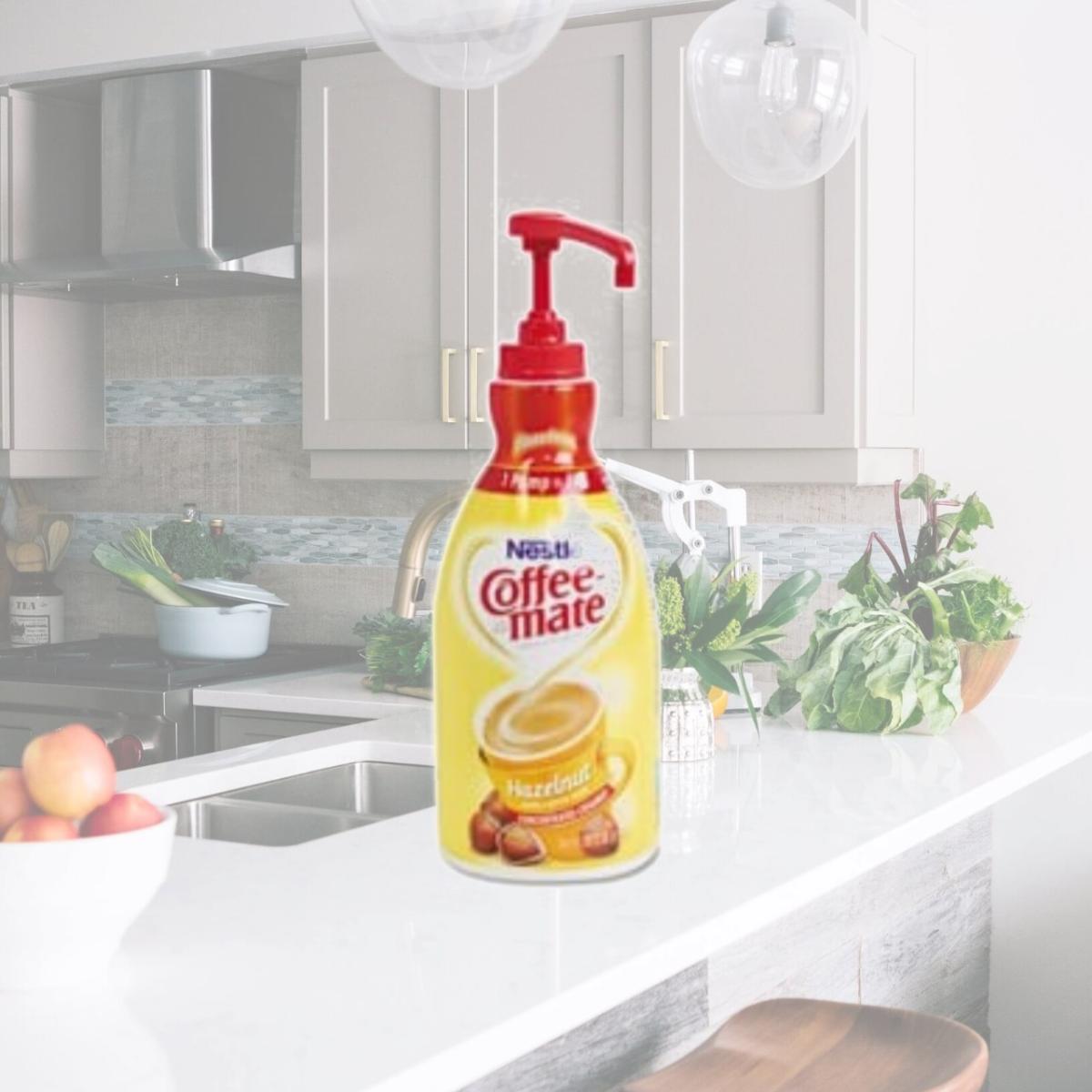 Picture of Coffee-Mate. 31831CT 1.5 L. Liquid Coffee Creamer - Hazelnut, 2 Per Box