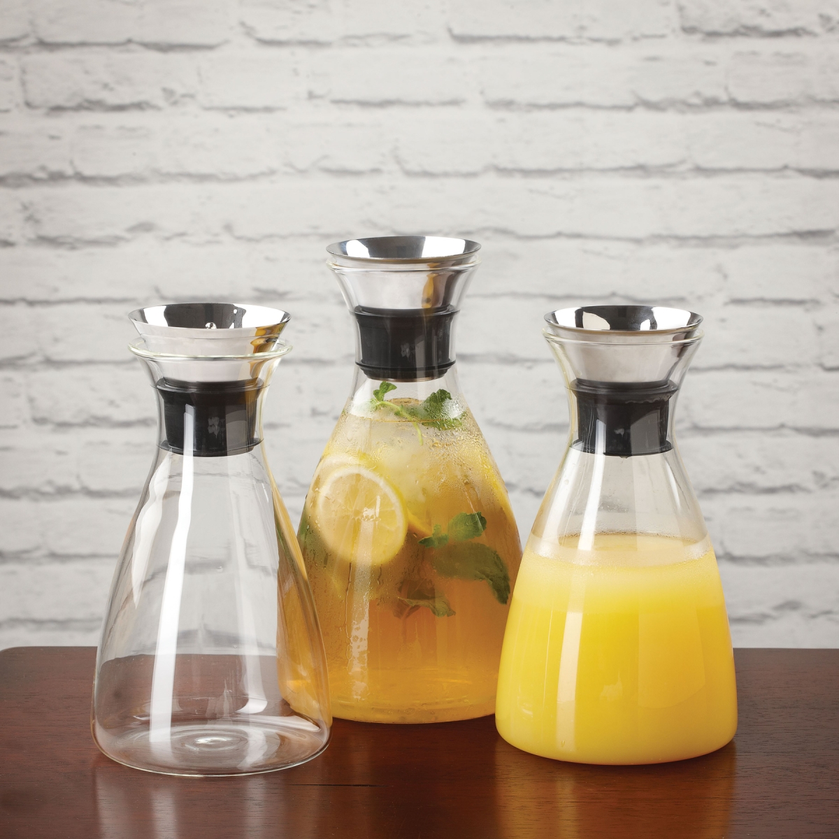 Picture of Winco GL-CRF-52 52 oz - 56 oz Rim-Full, 6 in. Dia. Glass Decanter with Dripless Lid, 9.75 in. Tall - Each 6