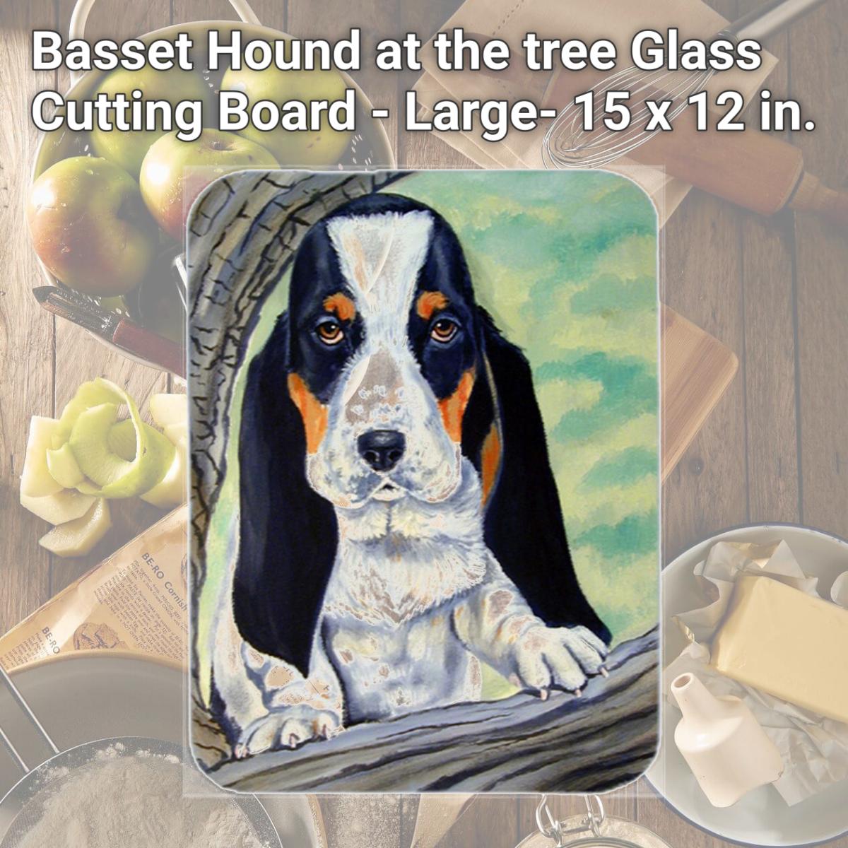 Picture of Carolines Treasures 7002LCB Basset Hound at the tree Glass Cutting Board - Large- 15 x 12 in.