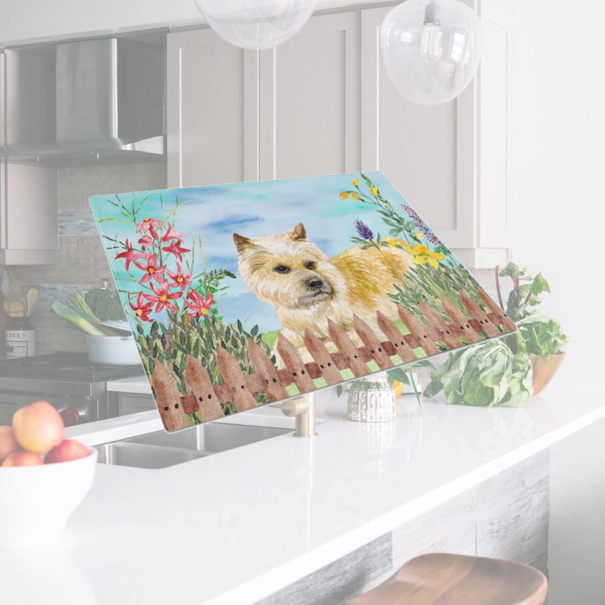 Picture of Carolines Treasures CK1252LCB Cairn Terrier Spring Glass Cutting Board, Large