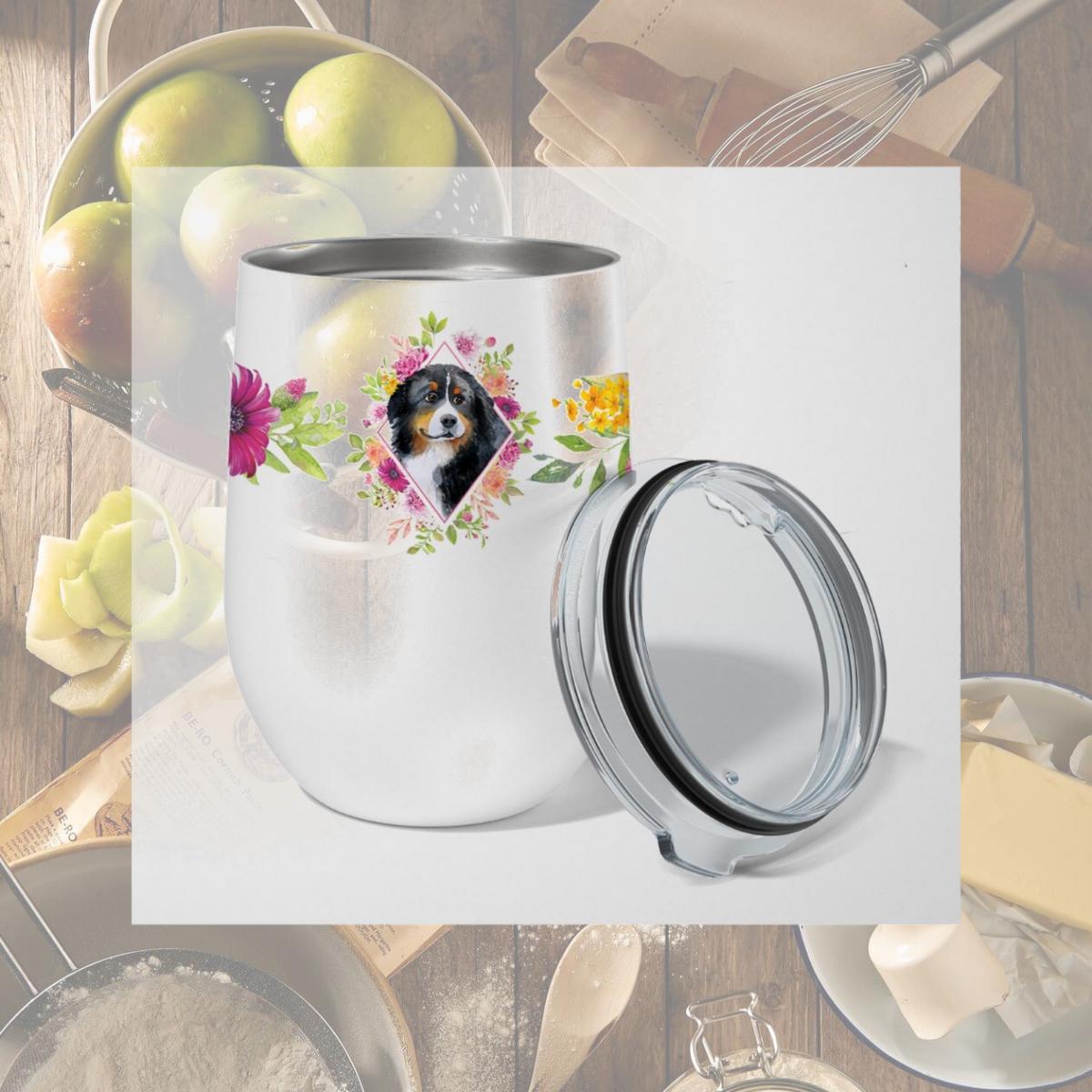 Picture of Carolines Treasures CK4118TBL12 12 oz Bernese Mountain Dog Pink Flowers Stainless Steel Stemless Wine Glass