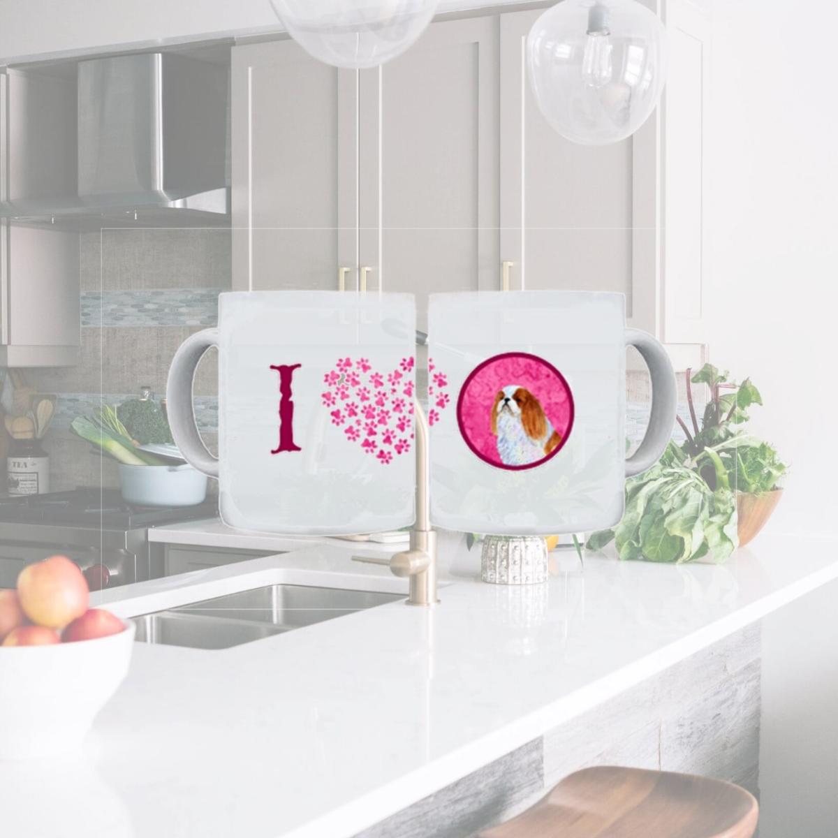 Picture of Carolines Treasures SS4783-PK-CM15 15 oz. English Toy Spaniel Dishwasher Safe Microwavable Ceramic Coffee Mug