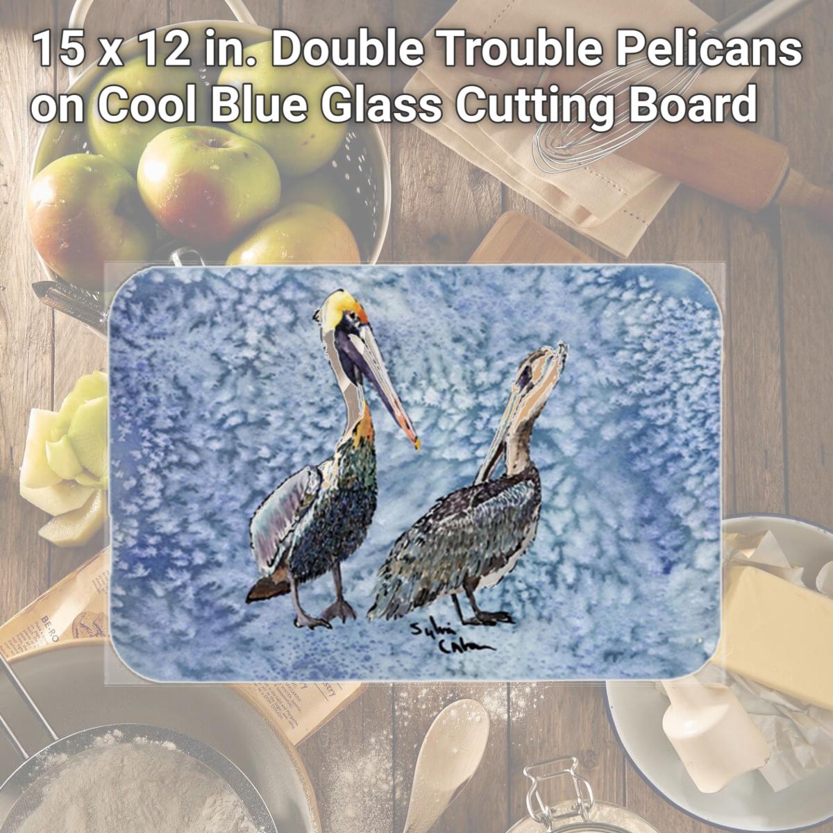 Picture of Carolines Treasures 8409LCB 15 x 12 in. Double Trouble Pelicans on Cool Blue Glass Cutting Board