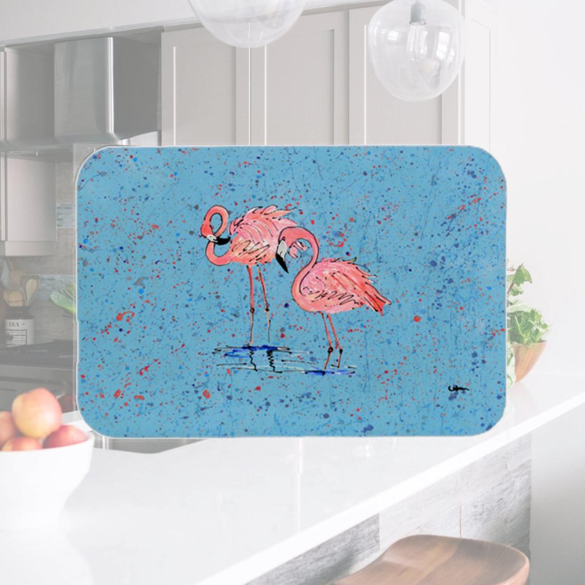 Picture of Carolines Treasures 8566LCB 15 x 12 in. Pink Flamingos on Blue Speckle Glass Cutting Board