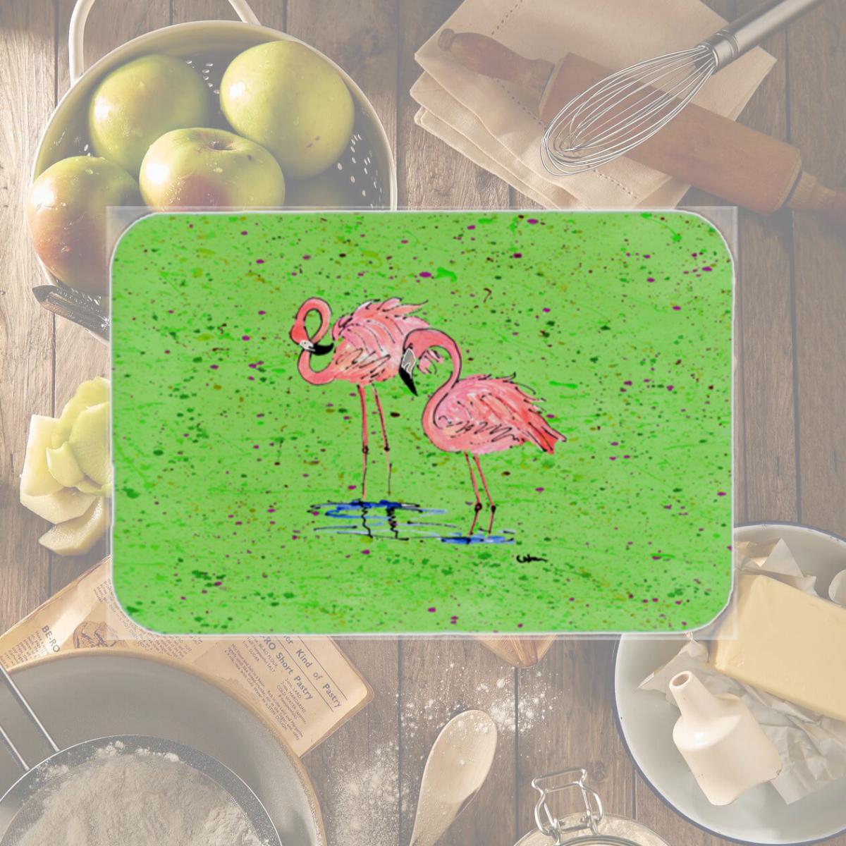 Picture of Carolines Treasures 8567LCB 15 x 12 in. Pink Flamingos on Green Speckle Glass Cutting Board