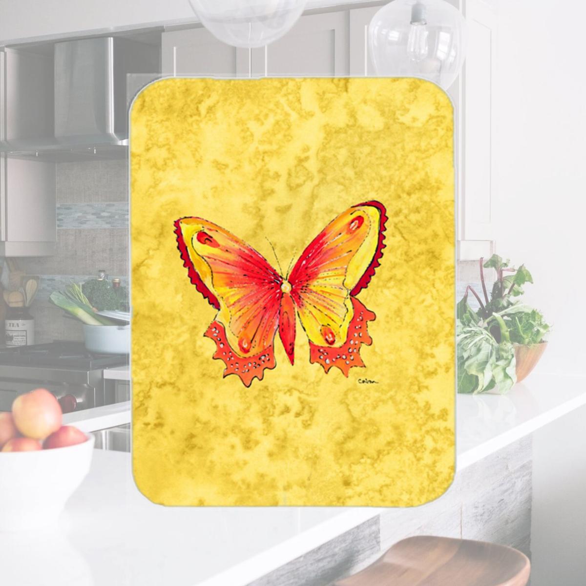 Picture of Carolines Treasures 8857LCB Butterfly On Yellow Glass Cutting Board - Large