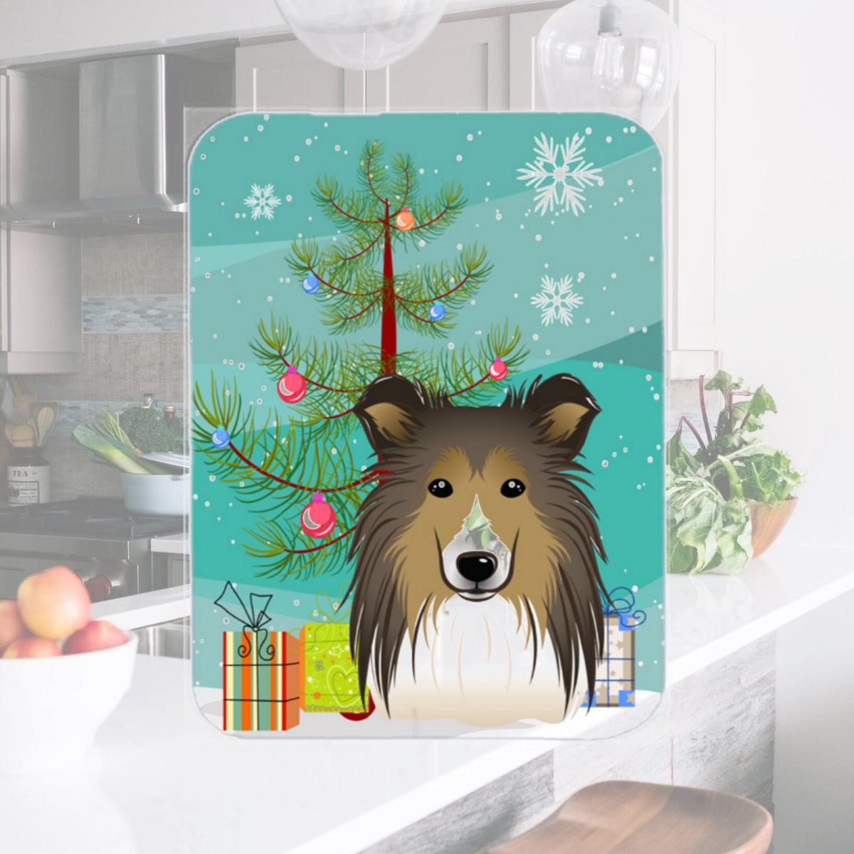 Picture of Carolines Treasures BB1614LCB Christmas Tree And Sheltie Glass Cutting Board- Large