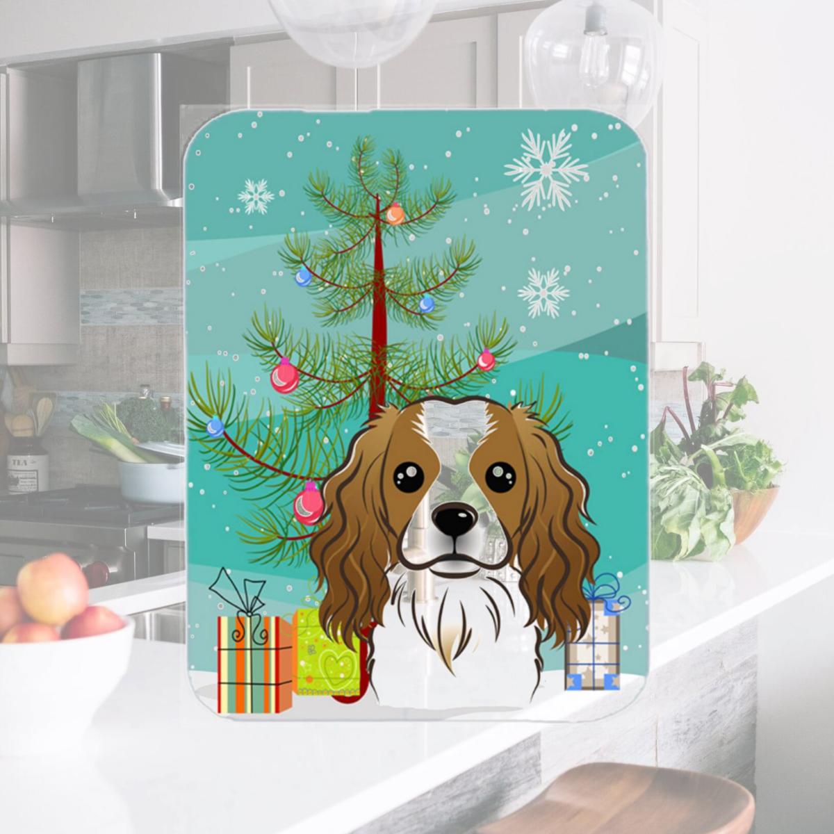 Picture of Carolines Treasures BB1596LCB Christmas Tree And Cavalier Spaniel Glass Cutting Board- Large