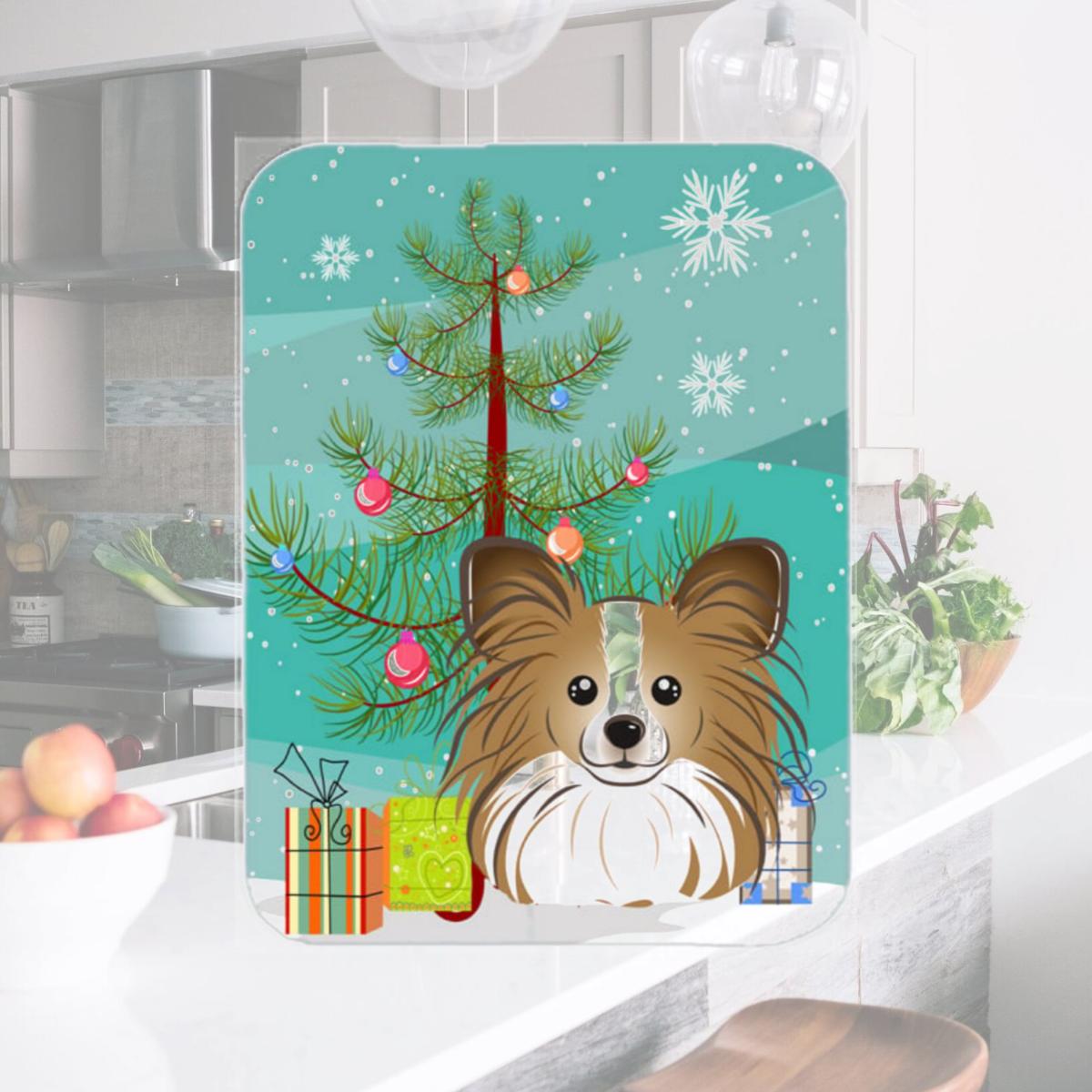 Picture of Carolines Treasures BB1620LCB Christmas Tree And Papillon Glass Cutting Board- Large
