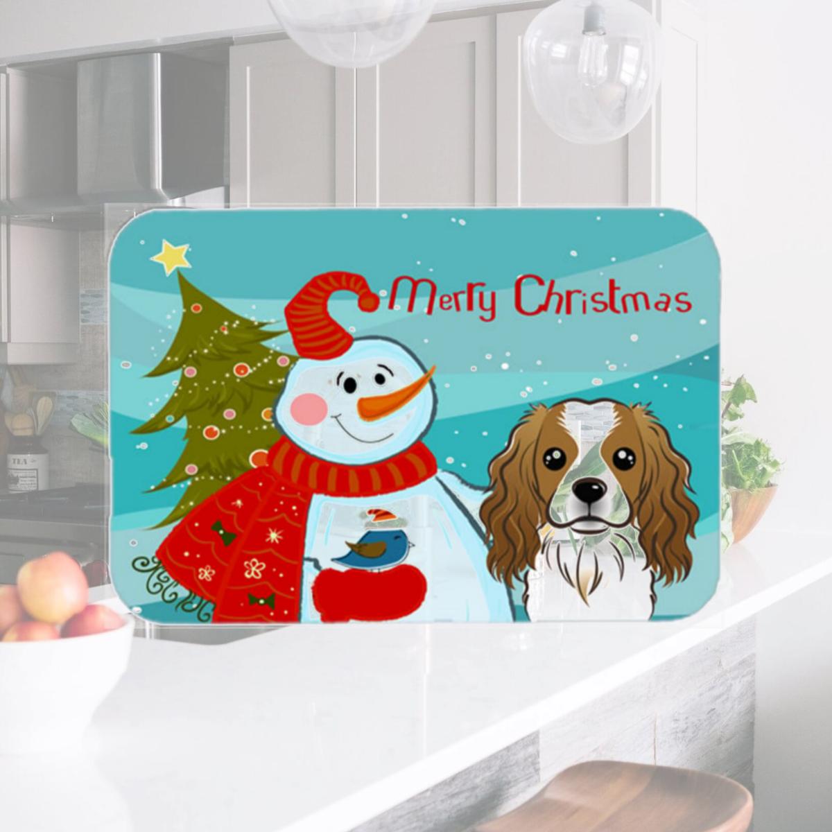Picture of Carolines Treasures BB1844LCB Snowman With Cavalier Spaniel Glass Cutting Board- Large