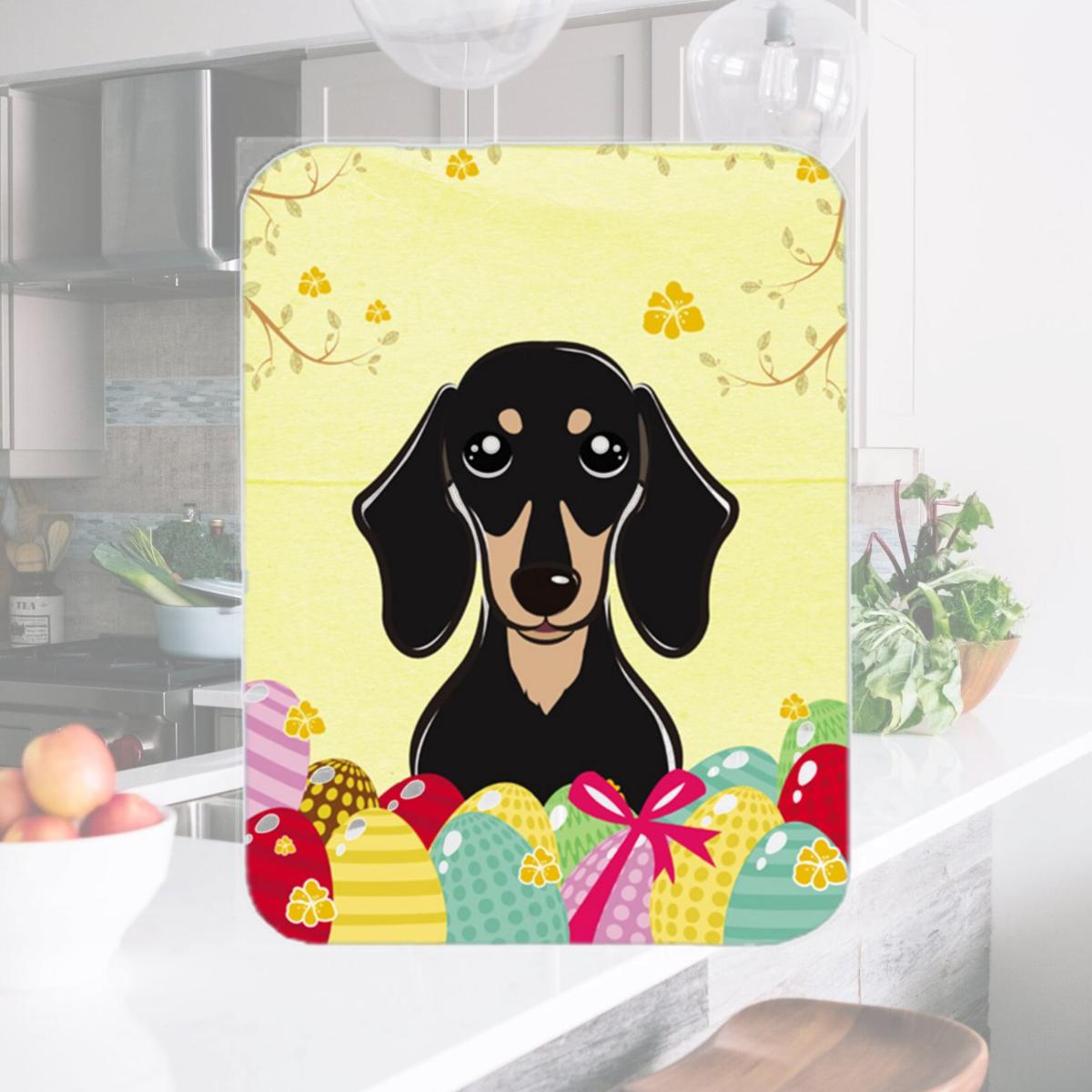 Picture of Carolines Treasures BB1897LCB Smooth Black and Tan Dachshund Easter Egg Hunt Glass Cutting Board- Large