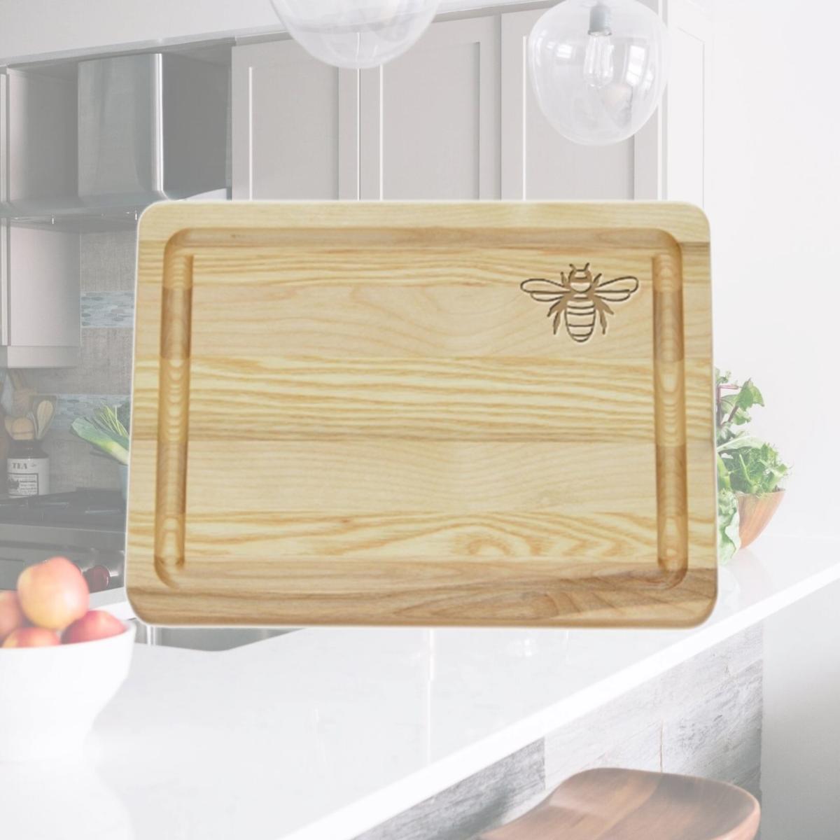 Picture of Carved Solutions Master Collection Wooden Cutting Board Small -Bee