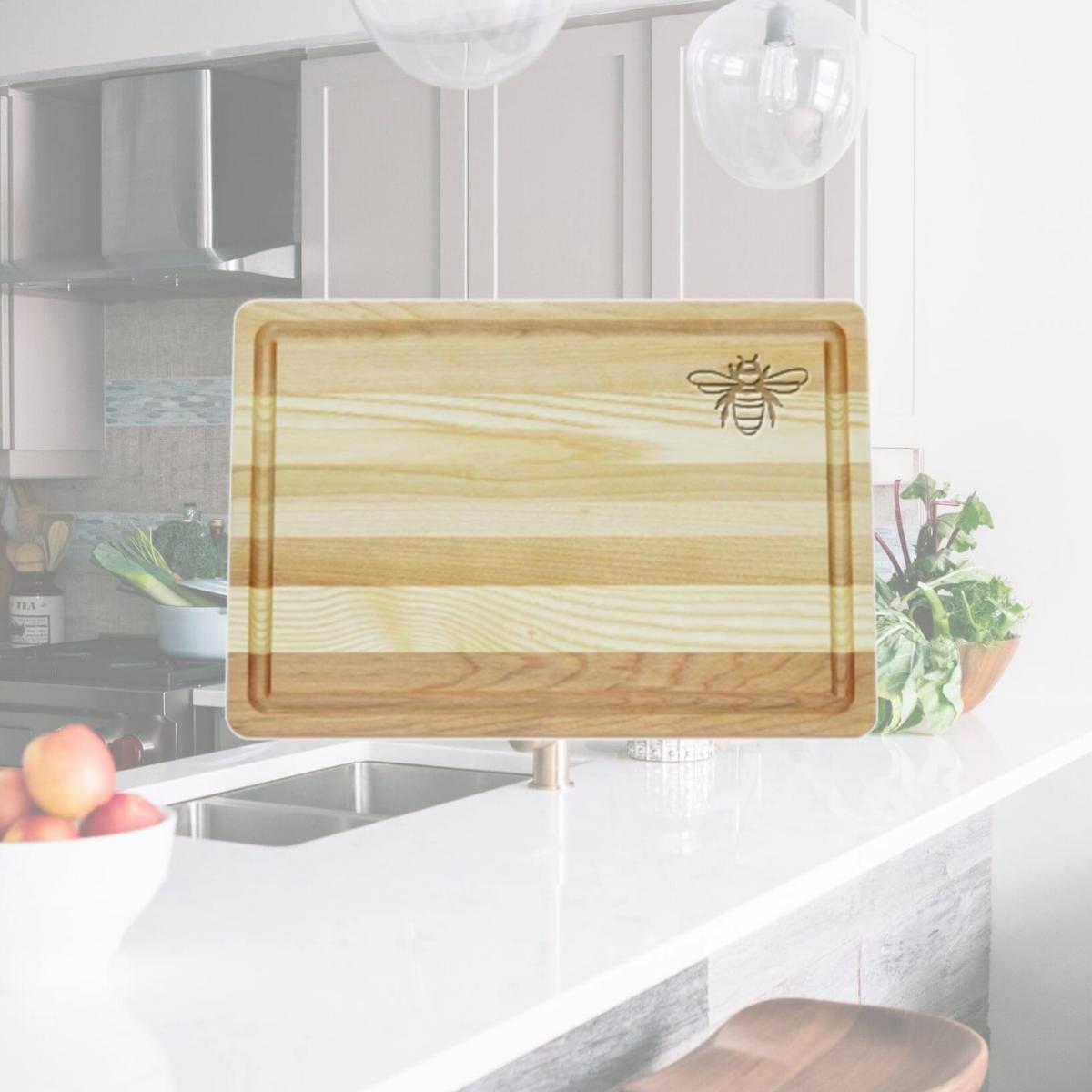 Picture of Carved Solutions Master Collection Wooden Cutting Board Medium-Bee