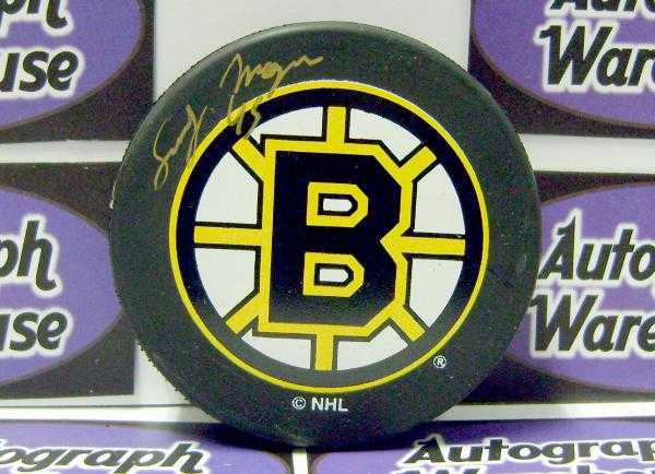 86341 Sandy Moger Autographed Hockey Puck Boston Bruins