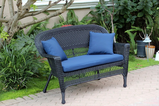 Black Wicker Patio Love Seat With Blue Cushion And Pillows