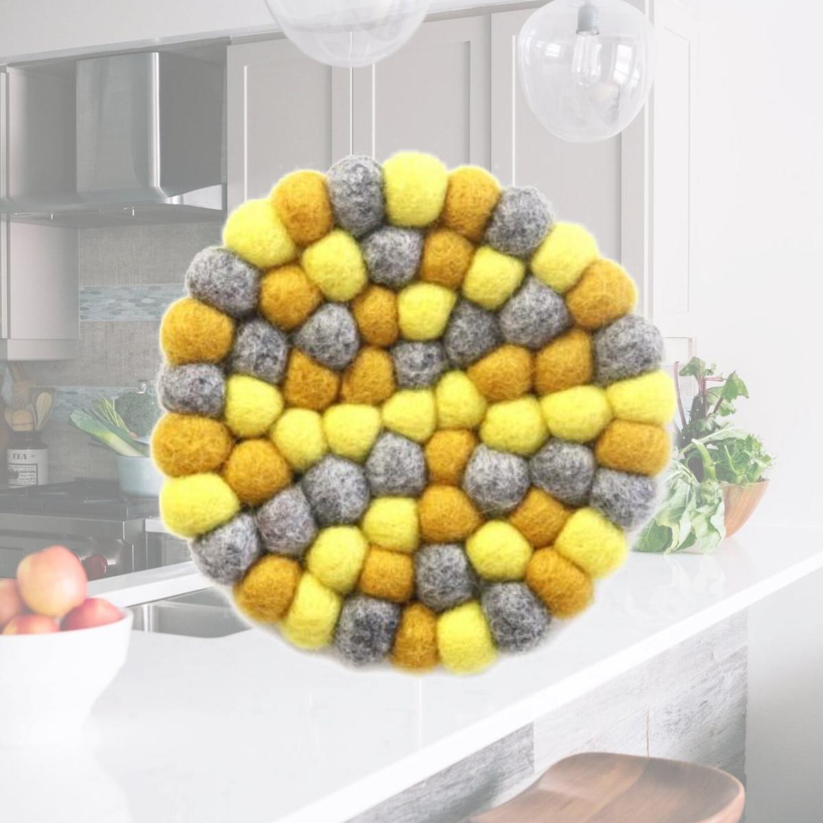 Picture of Global Groove GLG50058-03L Round Chakra Hand Crafted Felt Ball Trivets from Nepal, Yellows