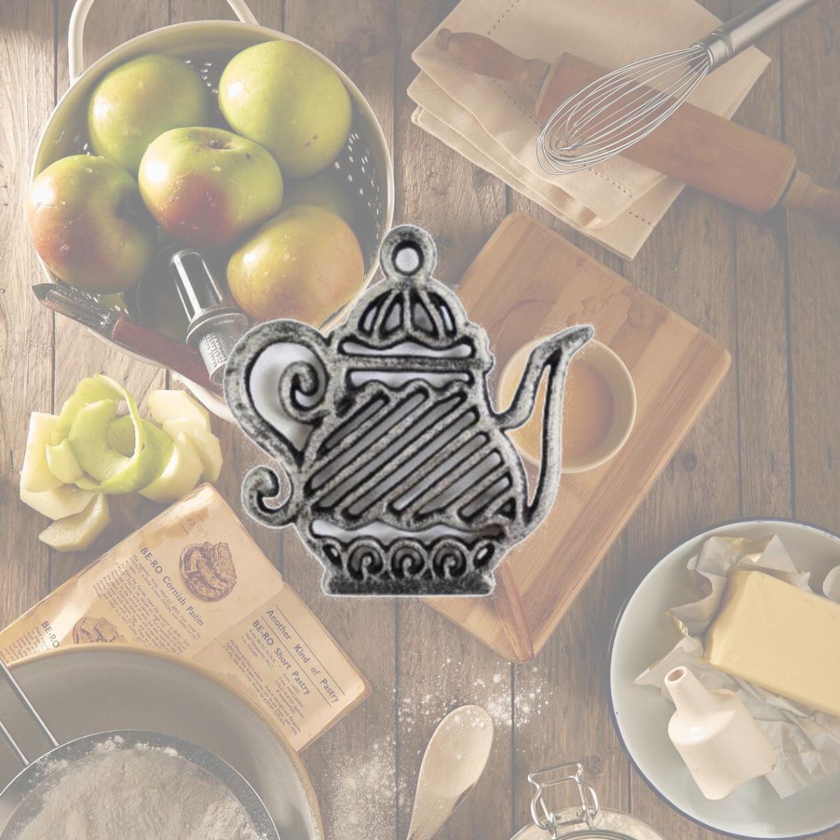 Picture of Handcrafted Model Ships K-0267-Silver 9 in. Rustic Silver Cast Iron Teapot Trivet