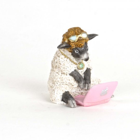Sheep With Computer Figurine