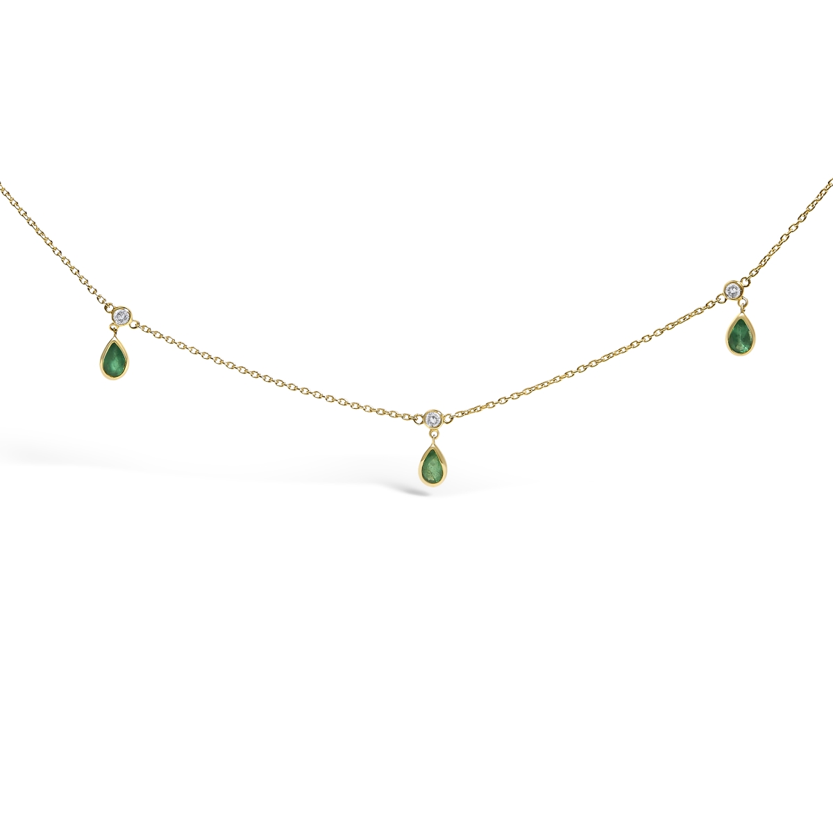 023555NASH Women 10K Yellow Gold Dangling 5 x 3 mm Green Emerald & Diamond Station Necklace - 18 in.