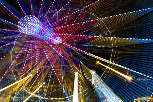 UPC 714224088651 product image for Colourful Lights of A Moving Ferris Wheel At Nighttime - Calgary Alberta Canada  | upcitemdb.com