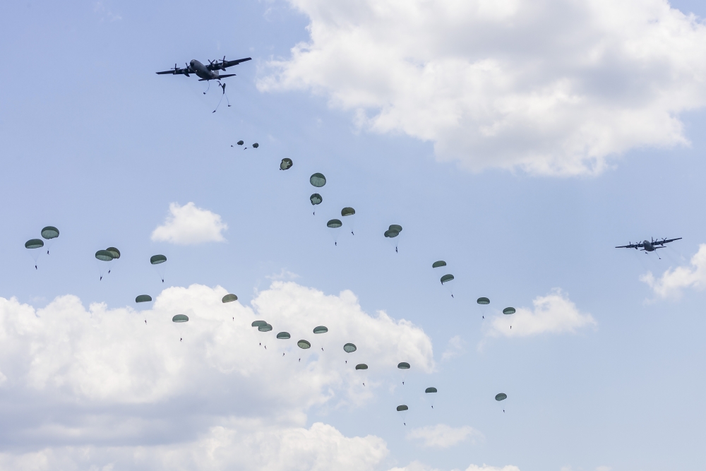 Stocktrek Images U.s. Air Force C-130 Hercules Drop U.s. Army Airborne Troops Over Andrews Air Force Base Maryland Poster Print, 17 X 11