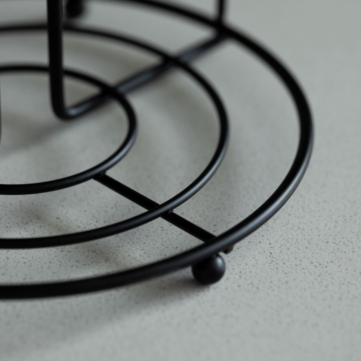 Picture of Basicwise QI004450 Black Iron Paper Towel Holder Stand - Countertop Dispenser with Weighted Non-Slip Base, Raised Frame, Fits Jumbo Rolls, Durable Freestanding Design for Kitchen, Bathroom, 7x7x12.25 in