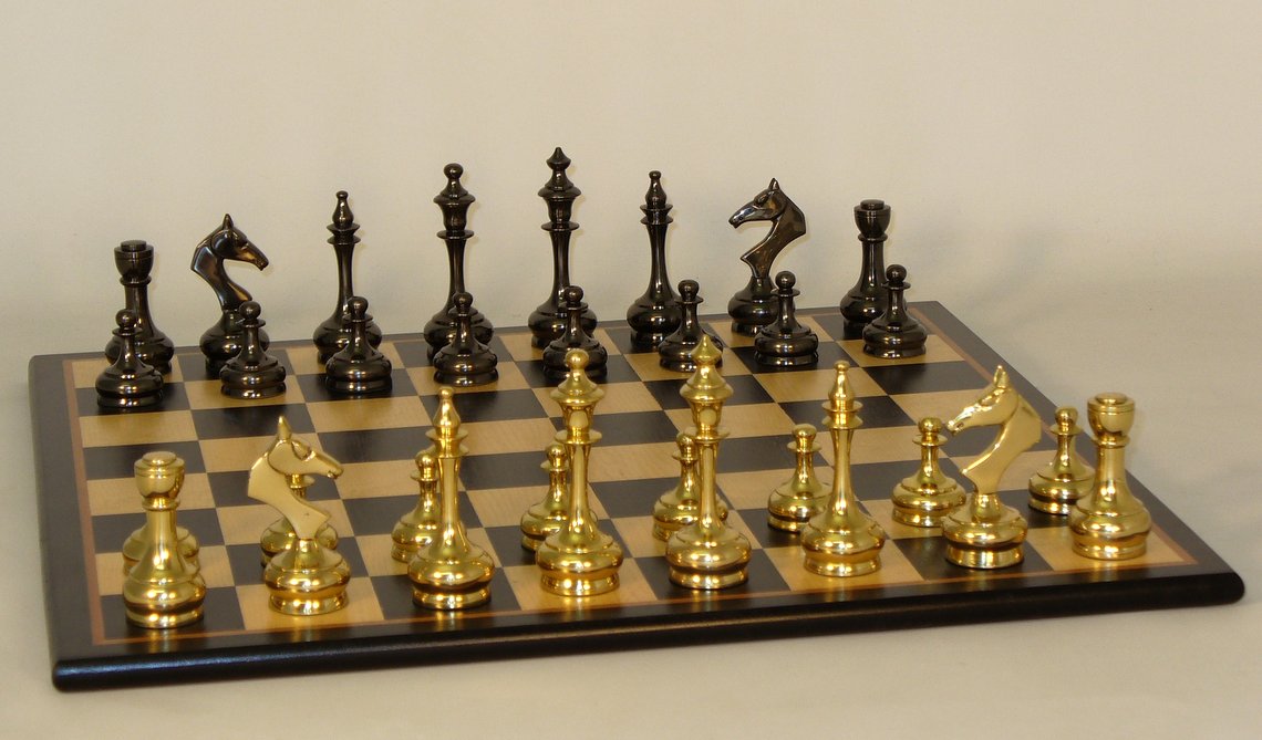 37bss-bbm Brass Slim Men On Black Birdseye Maple Chess Board