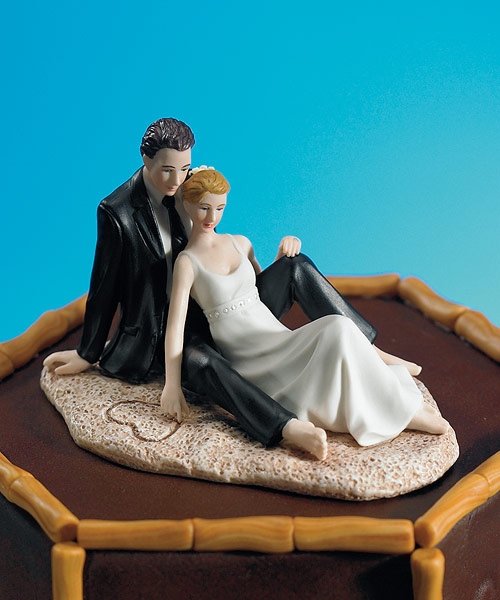 Romantic Wedding Couple Lounging on the Beach Figurine.