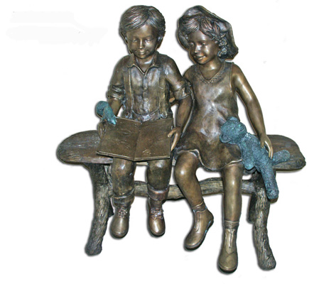 Boy And Girl On Bench