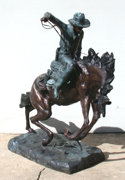 Metropolitan Galleries SRB30301 Cowboy Riding Horse Bronze