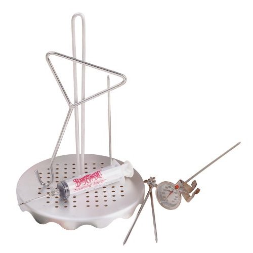 a image of a turkey. Including a turkey rack, a hook, a skewer set, a turkey injector, 