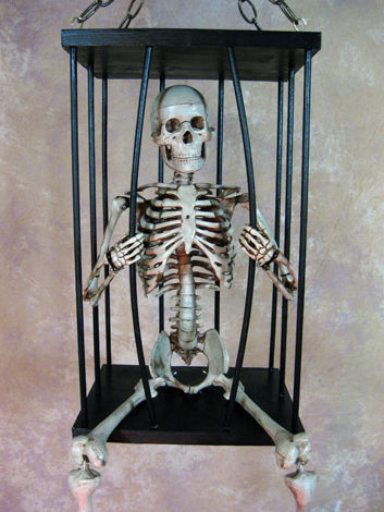Cage-400 Med. Skeleton Breaking Out Of Cage
