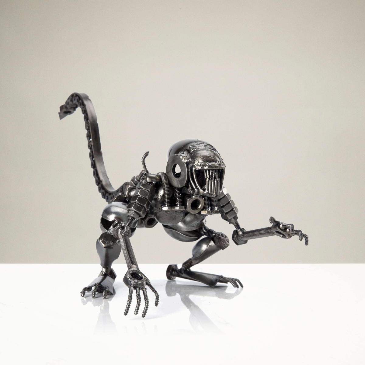 6.5 in. Alien Crouched Inspired Recycled Metal Sculpture