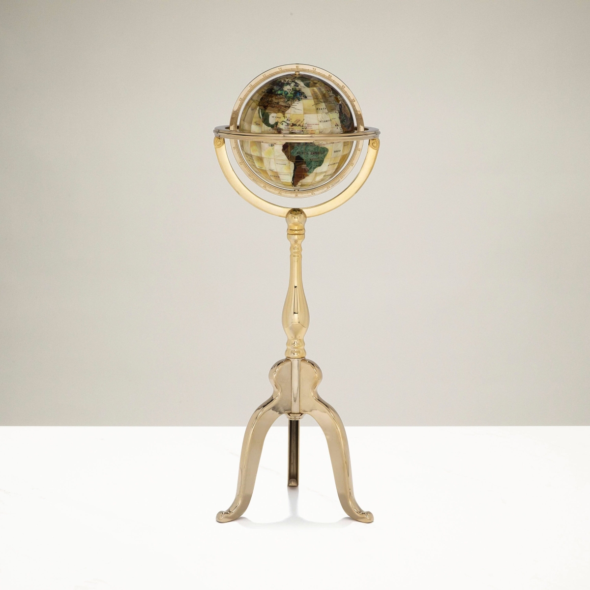 Picture of Kalifano GTS220G-MOP 9 in. Gemstone Globe with a Mother of Pearl Full Cut Ocean on a Gold Colored Masterpiece Stand
