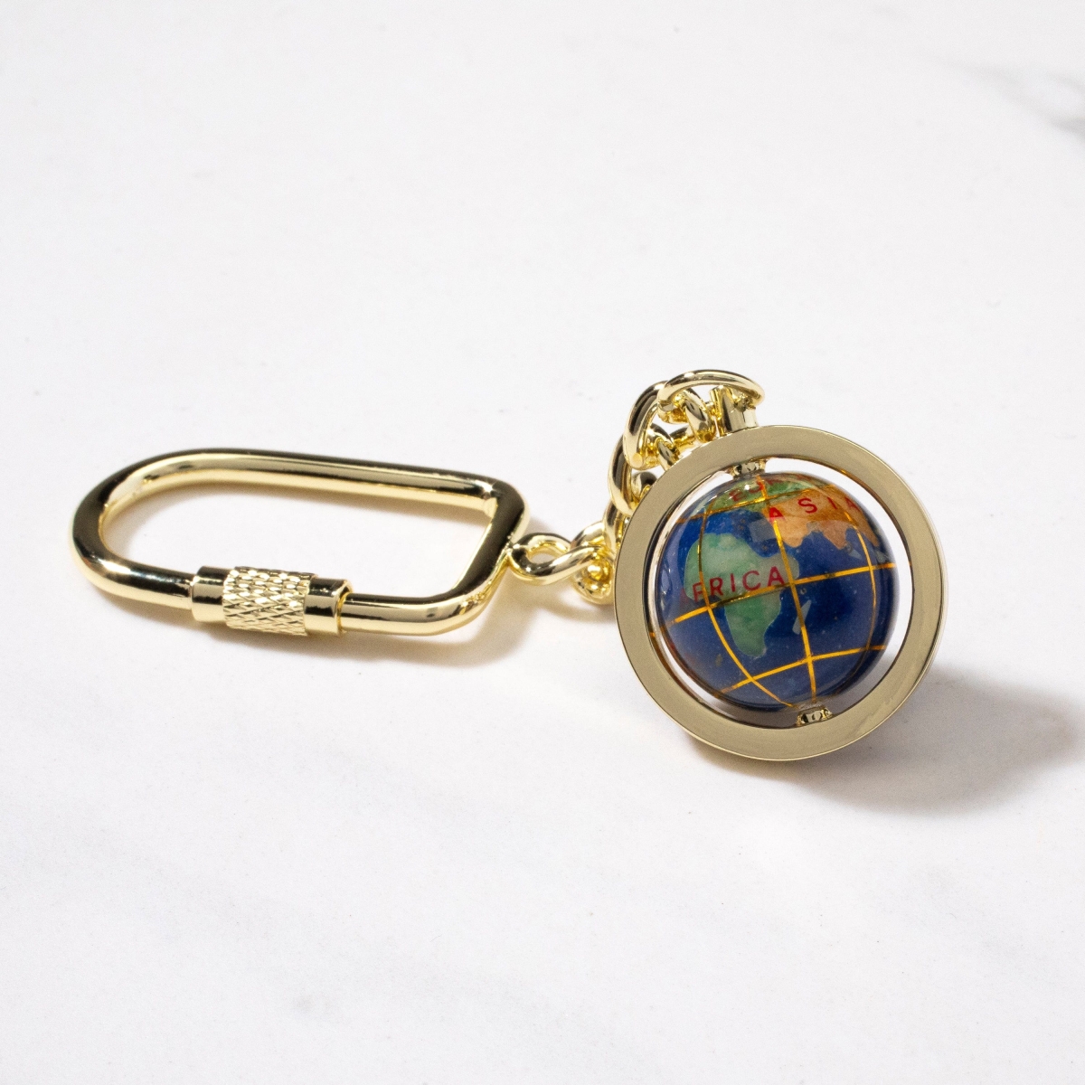 Picture of Kalifano LKCG-LP 4.5 in. Gemstone Globe with Lapis Ocean Showcased on a Gold Colored Keychain