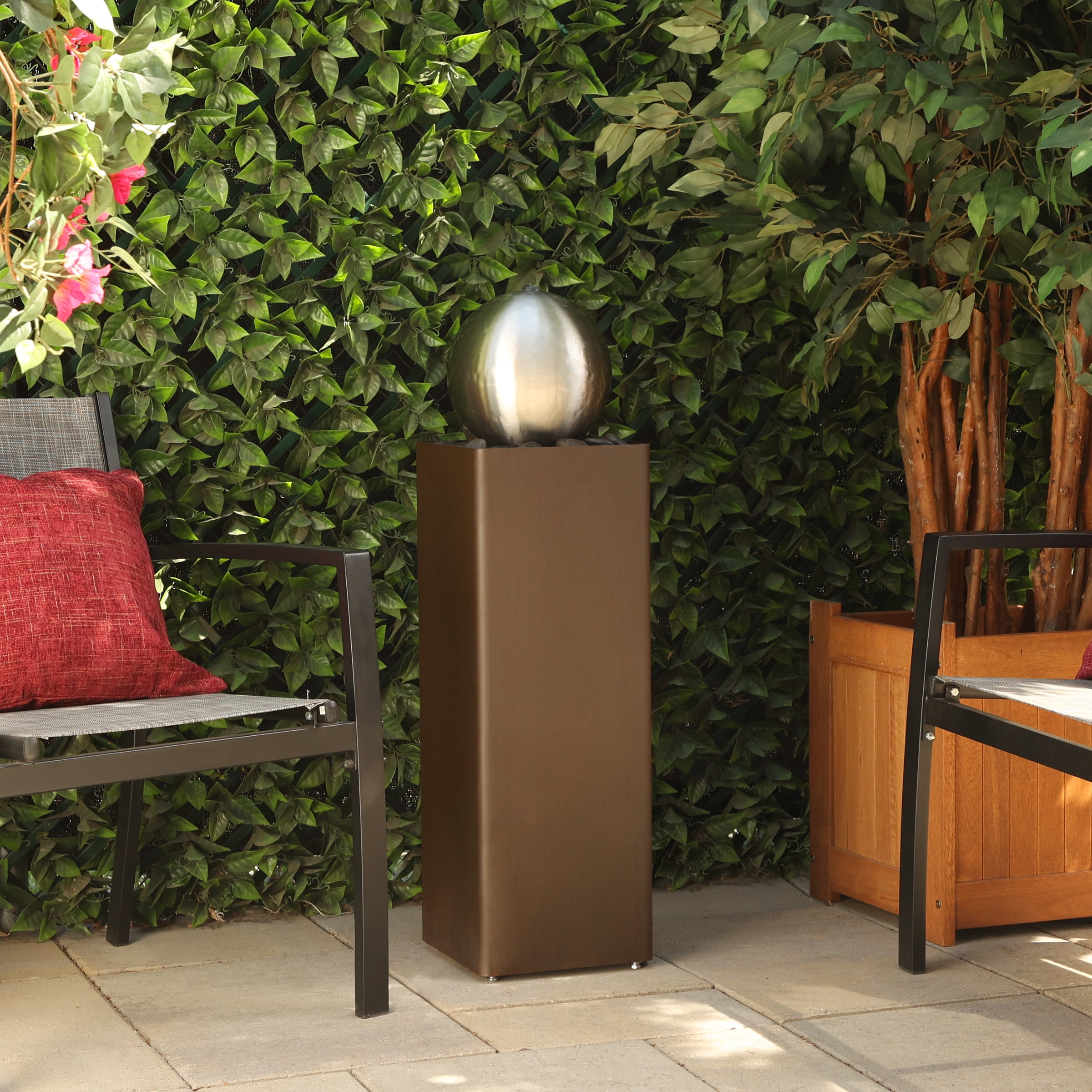 Self-Contained Metal Orb Fountain with River Stones