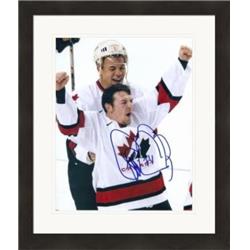 Picture of Autograph Warehouse 432477 8 x 10 in. Team Canada Calgary Flames legend No. SC1 Matted & Framed Theo Fleury Autographed Photo
