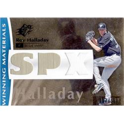 703082 Roy Halladay Player Worn Jersey Patch Toronto Blue Jays 2007 Upper Deck Winning Materials No.WMRH LE 57-150 Baseball Card