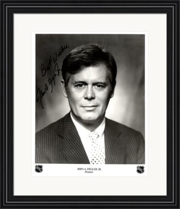 Picture of Autograph Warehouse 726203 John Ziegler Jr. Autographed 8 x 10 in. Photo - NHL Hockey President No.1 Matted & Framed