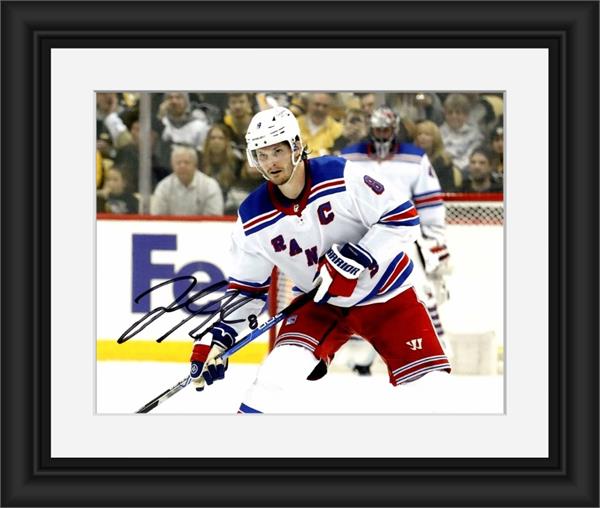 Picture of Autograph Warehouse 793817 Jacob Trouba Autographed 8 x 10 in. Photo -   York Rangers No.SC3 Matted & Framed