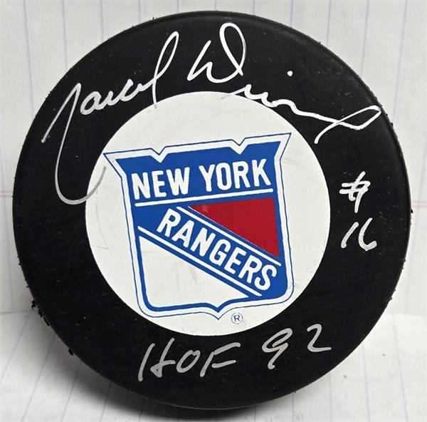 Picture of Autograph Warehouse 783589 Marcel Dionne Autographed Hockey Puck - Inscribed HOF 92 -   York Rangers with Display Cube