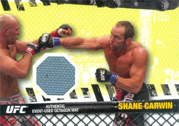 587758 Shane Carwin Fighter Used Octagon Mat Patch Trading Card - UFC, Ultimate Fighting Championship 2010 Topps No.FMSC