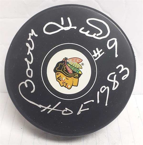 Picture of Autograph Warehouse 783367 Bobby Hull Autographed Hockey Puck Inscribed HOF 1983 - Chicago Blackhawks with Display Cube