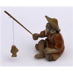 2 in. Glazed Fisherman Miniature Ceramic Figurine