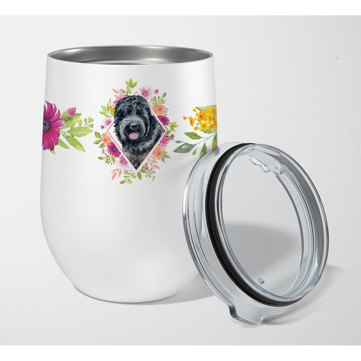 Picture of Carolines Treasures CK4176TBL12 12 oz Russian Black Terrier Pink Flowers Stainless Steel Stemless Wine Glass