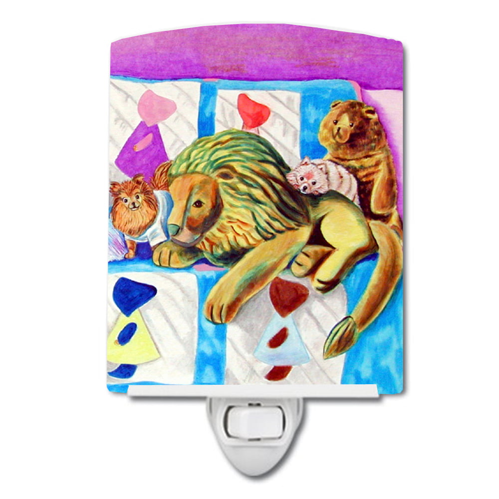 7103CNL Pomeranian on the Couch with Toy Tiger Ceramic Night Light