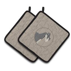 Picture of Carolines Treasures CK2206PTHD Schnauzer In the Kitchen Pair of Pot Holders