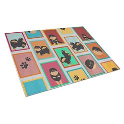 MLM1126LCB 15 x 12 in. Unisex Lots of Black & Tan Pomeranian Glass Cutting Board - Large